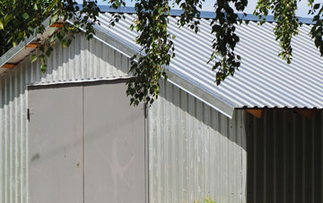 repairing St Harmon metal garage roofing